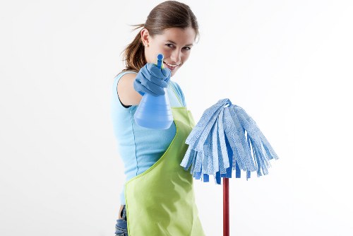 Airbnb cleaning team preparing a Camden short-let living room for the next guest